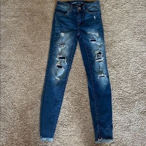 Ripped jeans with patches